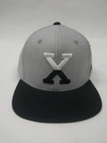 X Cap