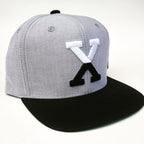 X Cap